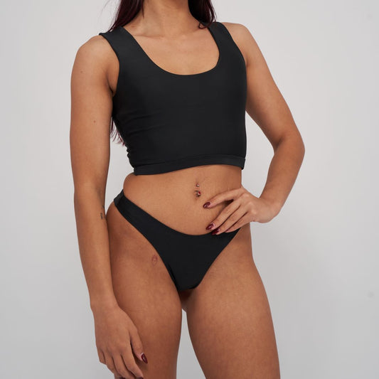 Black reversible polewear top with versatile design, Adrienne Reversible Top by Poler Bare Boutique